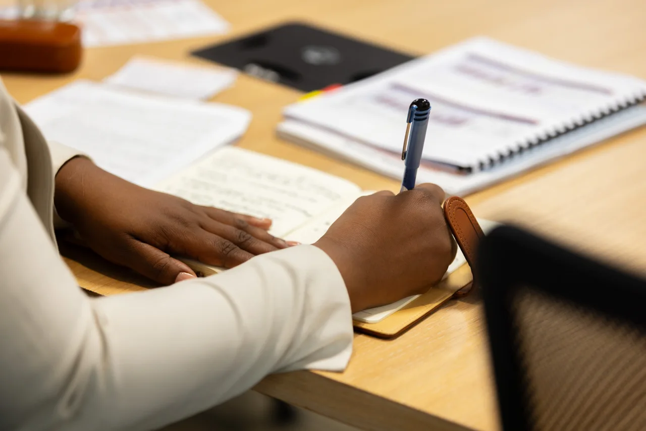 Handwritten notes and planning documents for a production brief